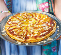 Peach puff pastry tart with almonds recipe | BBC Good Food