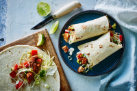 Chicken Fajita Burritos with Feta Crema Recipe | MyRecipes