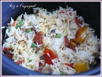 Un riz à l'espagnol dans le rice cooker - Recette Ptitchef