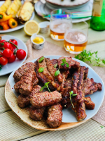 Homemade mici - the famous Romanian garlicky meat open sausages